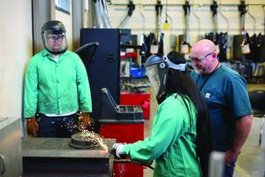 Shop students and teacher